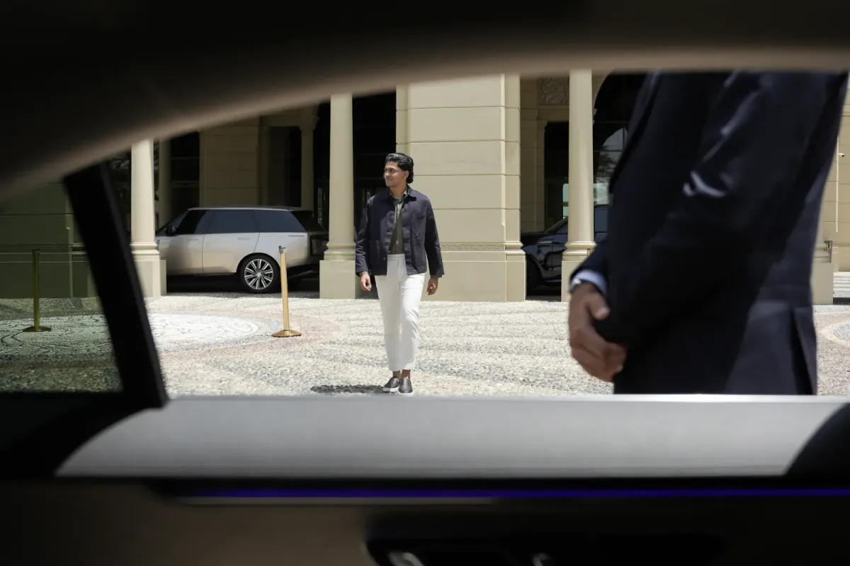Airport concierge assisting travelers with fast-track service